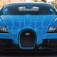Image for article titled What Kind Of Wealthy Nutjob Paints Their Bugatti In A Transformers Theme?